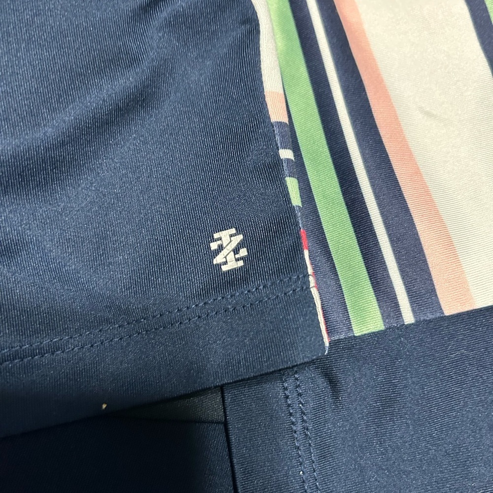 Izod Dark Blue Golf or Tennis skort with Multicolor Stripes - Picture 6 of 7